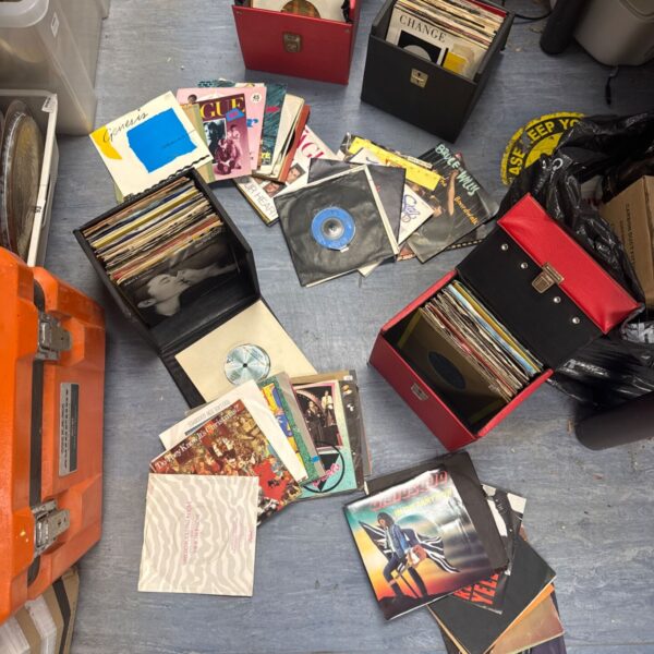 Lot of 80s vinyl records including Human League and Genesis singles.