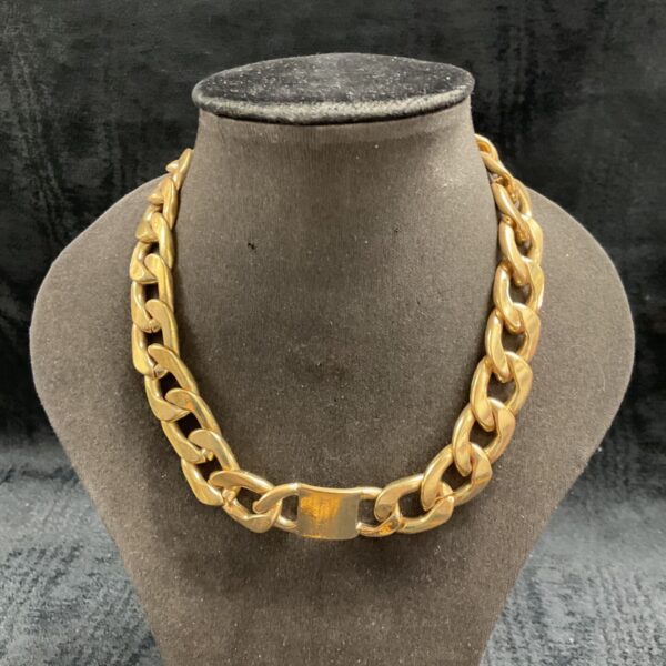 Close-up of 9 carat gold plated curb chain choker necklace.