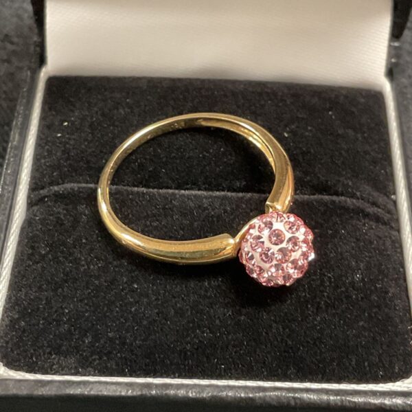 9ct gold ring with pink crystal in a presentation box.