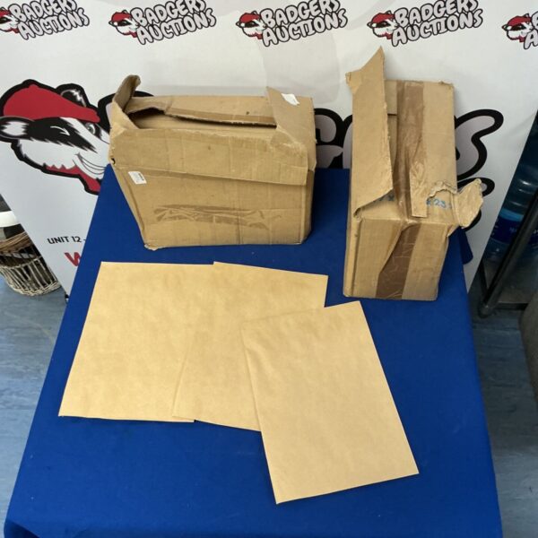 Two boxes of A4 envelopes for mailing and stationery.