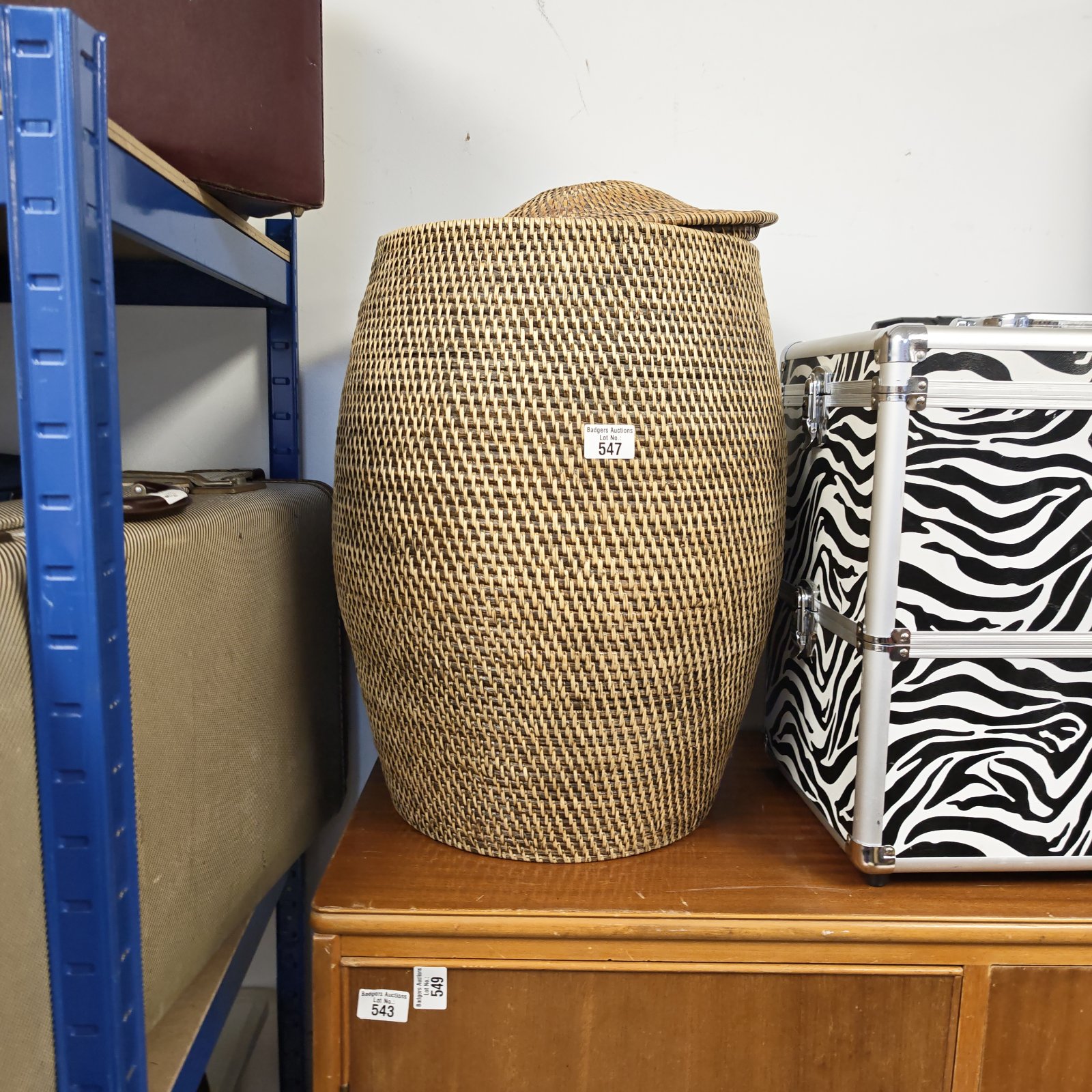 Large handwoven Alibaba basket for storage and decoration.