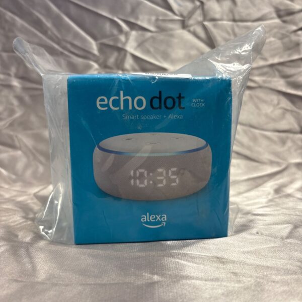 Amazon Echo Dot smart speaker with digital clock display.