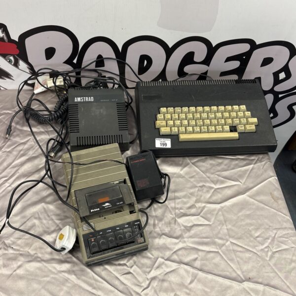 Vintage Amstrad CPC464 computer with keyboard and tape drive.
