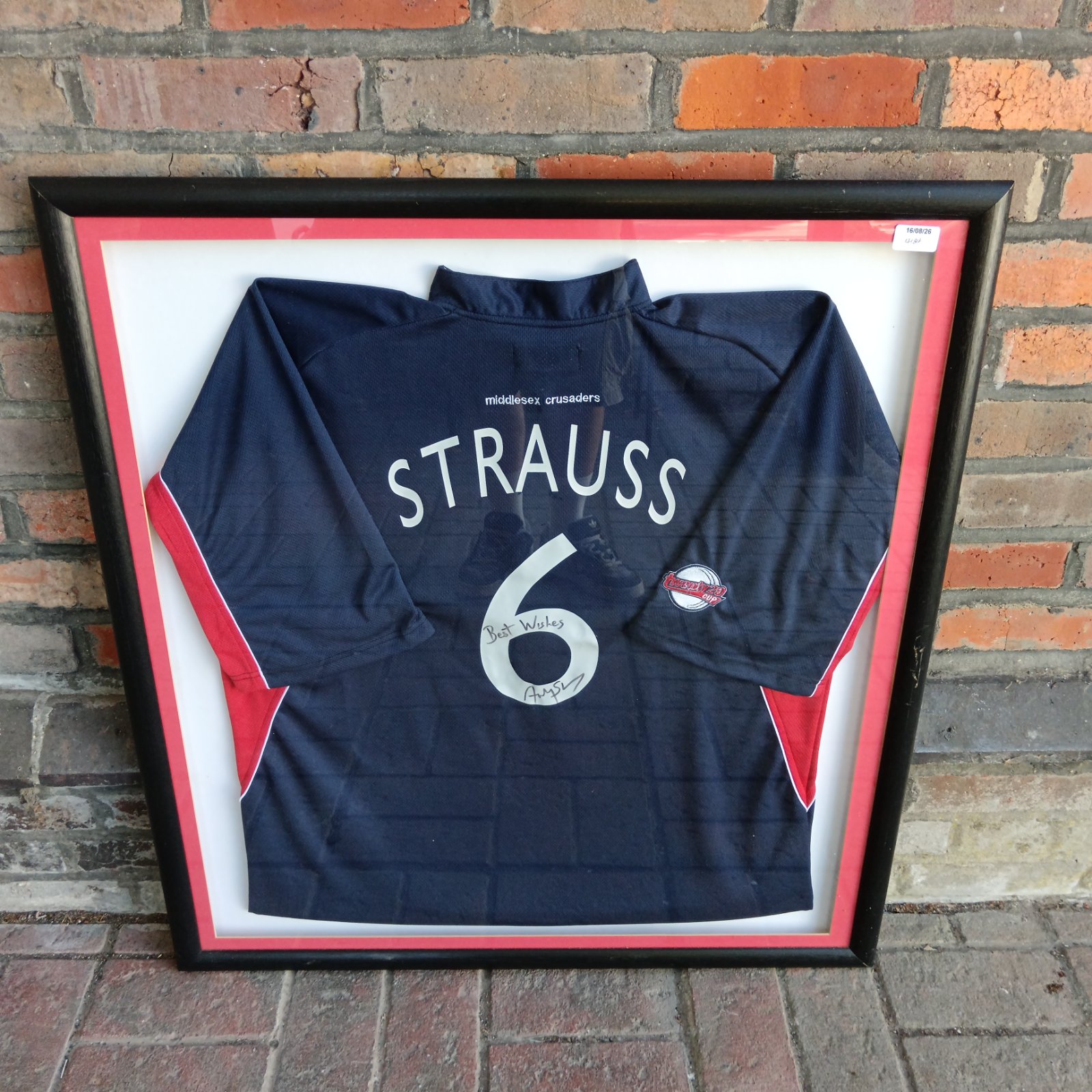 Framed Andrew Strauss signed Middlesex cricket shirt, sports memorabilia.