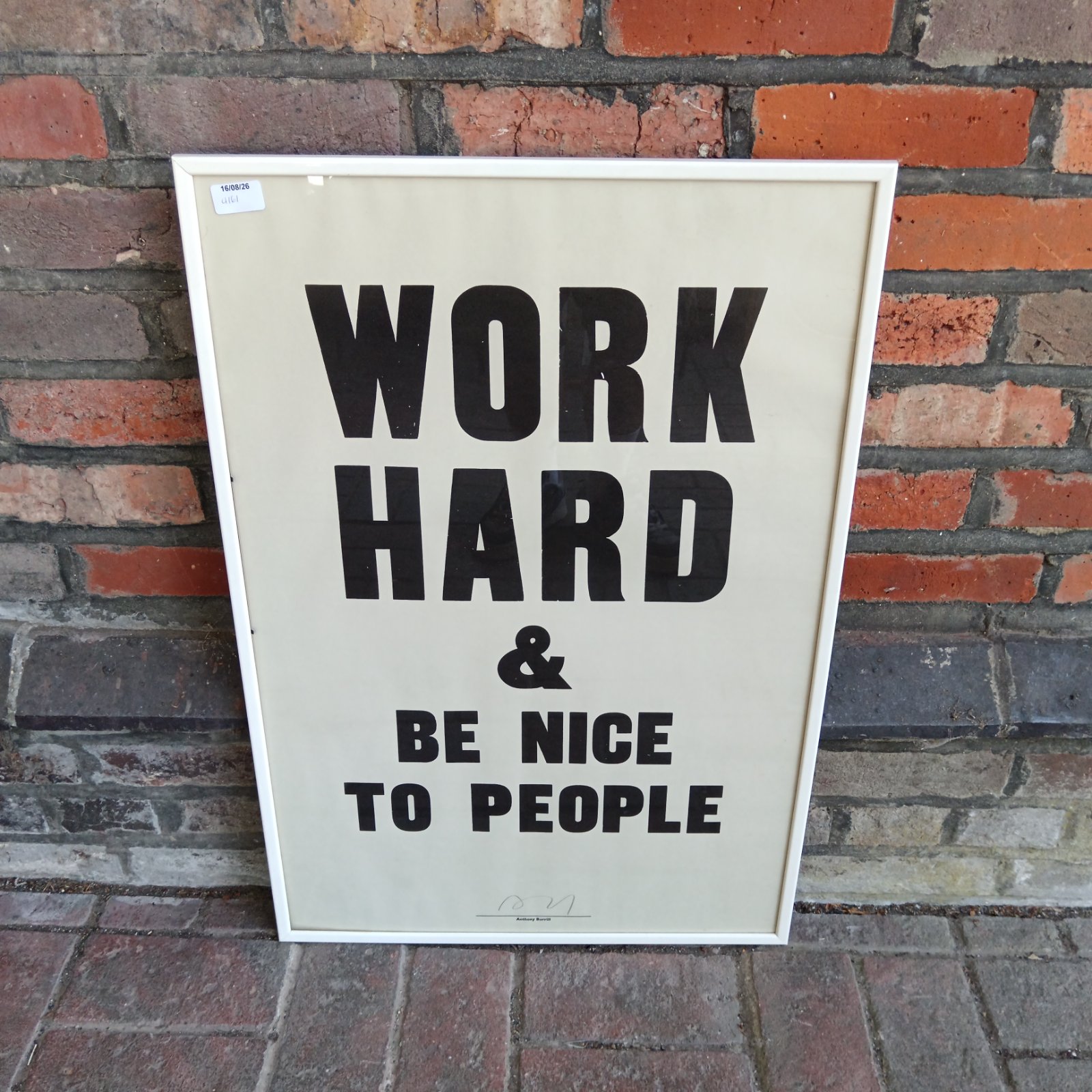 Anthony Burrill "Work Hard & Be Nice" print, a motivational graphic design piece.