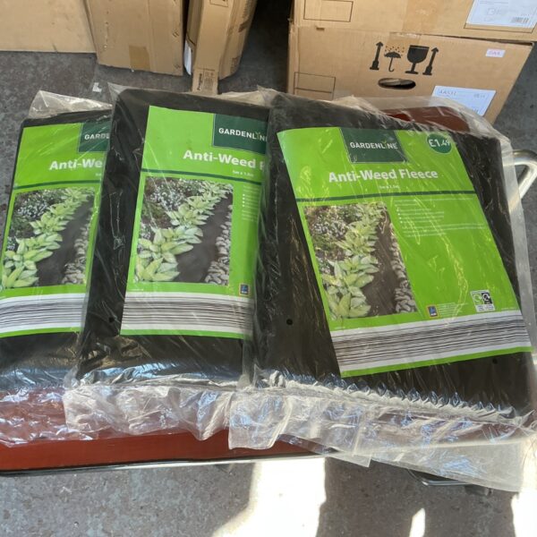 Three unopened packs of Gardeline anti weed fleece for garden protection.