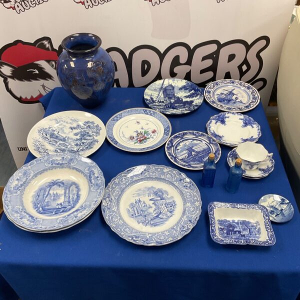 Antique blue and white pottery collection including Delftware style pieces.