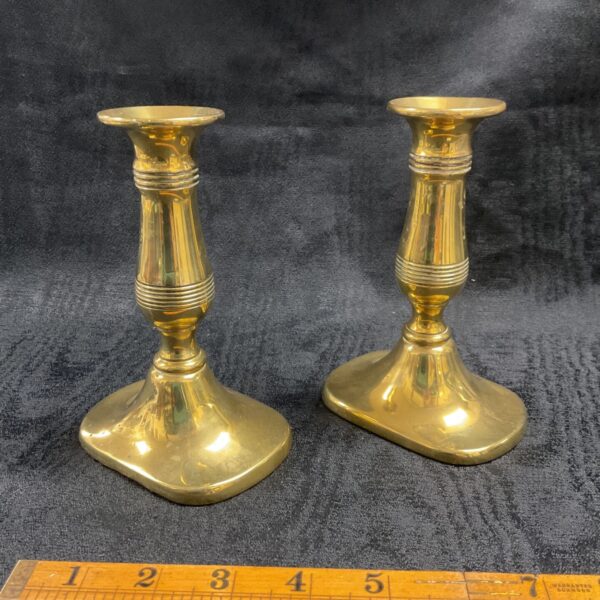 Antique brass candlesticks, a vintage pair for home decor.