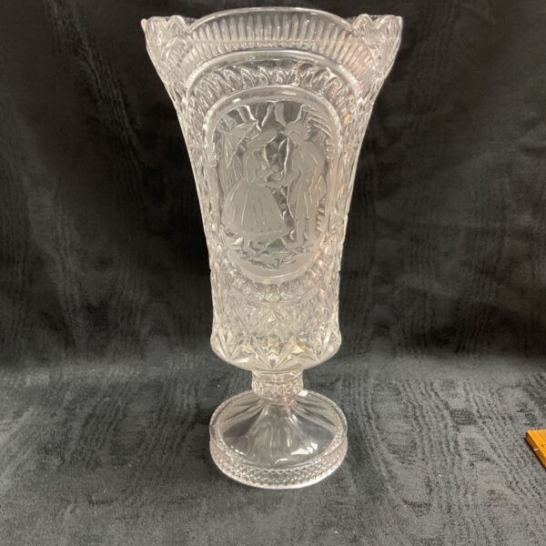 Large antique cut crystal vase in the style of Waterford crystal.