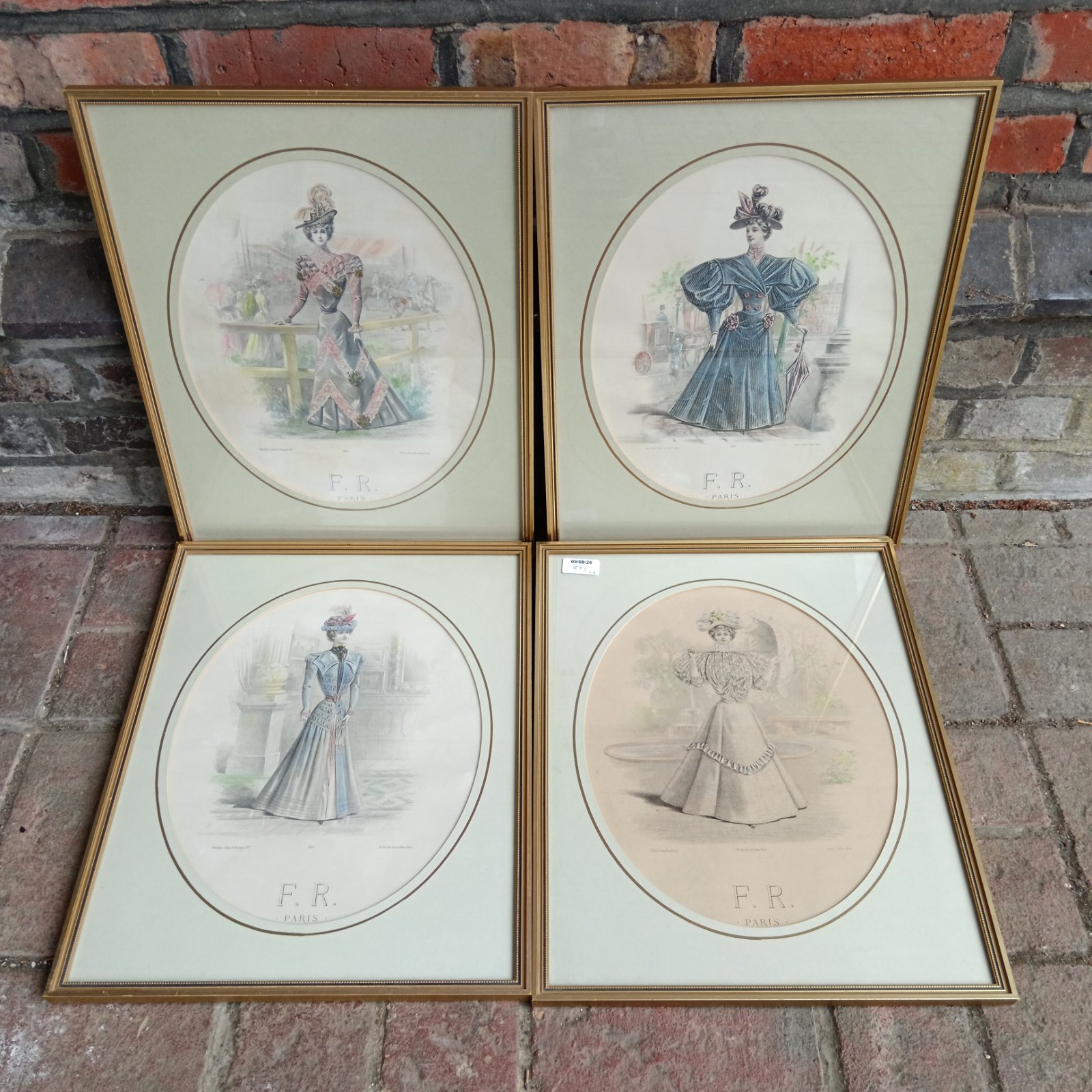 Antique fashion plate print of a French lady in a blue gown.