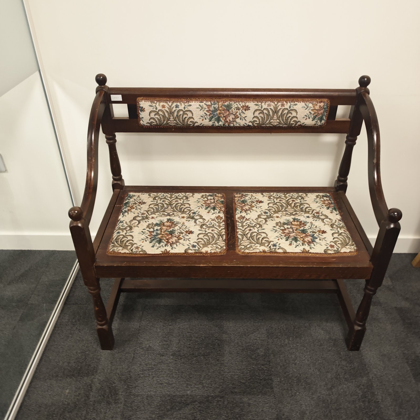 Antique hall bench with floral needlepoint upholstery, early 20th century.