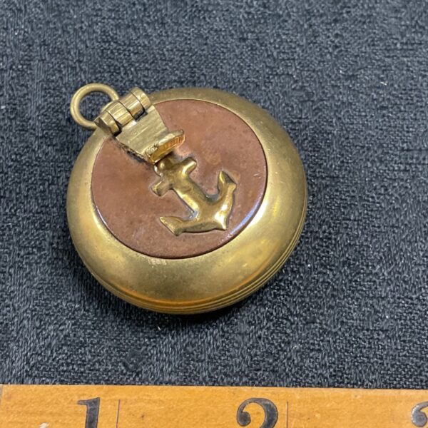 Antique navy snuff box fob with detailed anchor decoration.