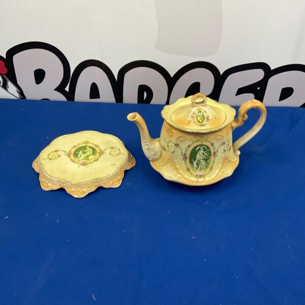 Antique W Adams Crown Porcelain teapot with stand, floral design.