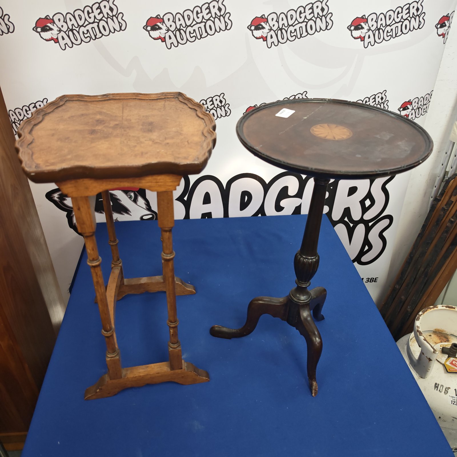 Antique walnut side table with a round jardiniere on display.