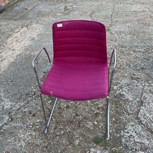 Magenta Arper Catifa 46 armchair with chrome base.