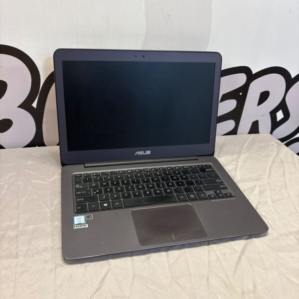 Asus UX305U laptop for auction, showing the keyboard and screen.