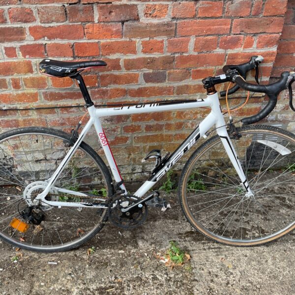 Avenir Perform 6061 road bike with drop handlebars.