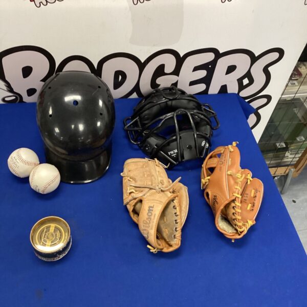 Baseball equipment lot featuring a helmet and gloves.