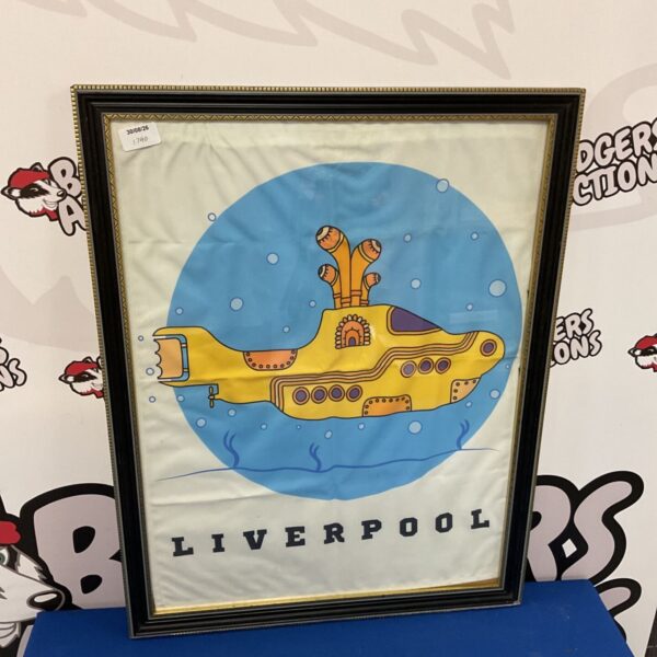 Framed Beatles Yellow Submarine textile print, vibrant 1960s wall art.