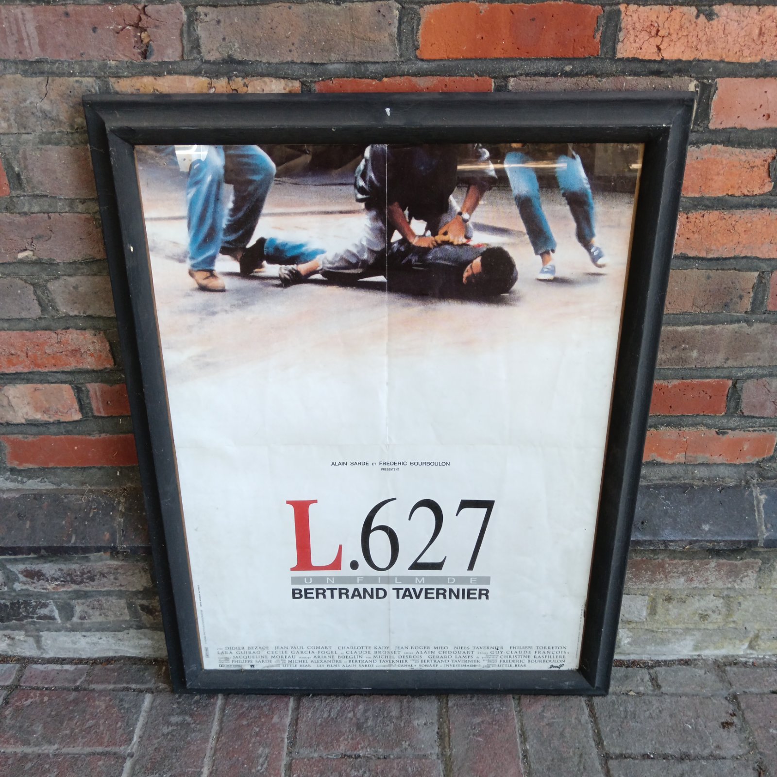 Vintage L.627 movie poster featuring Alain Sarde, a collectible French film poster.