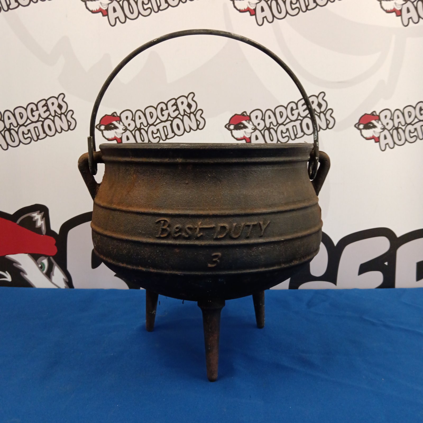 Antique Best Duty 3 cast iron cauldron with tripod legs.