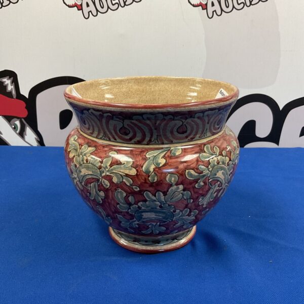 Vibrant Biagioli Italian pottery plant pot with floral design.