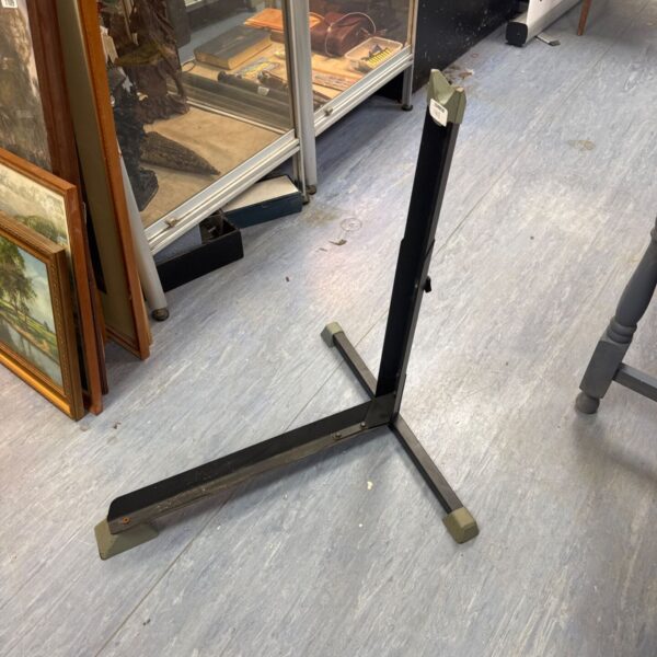 Metal bicycle floor stand for repair and maintenance.