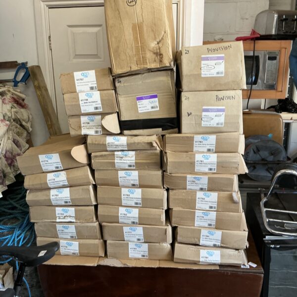 Job lot of boxed birthday party invitations and candles for celebrations.