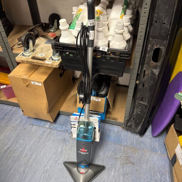 Used Bissell Steam Mop Select with replacement pads for floor cleaning.