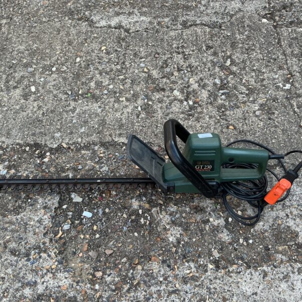Vintage Black & Decker GT230 electric hedge trimmer with 20-inch blade.