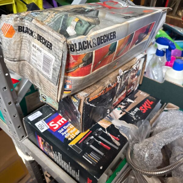 Vintage power tools lot including Black & Decker and Skil, ideal for collectors.