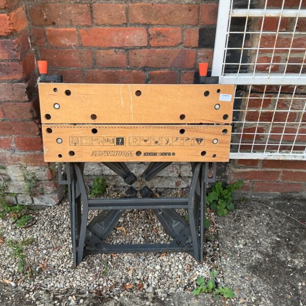 Black and Decker Workmate workbench showing signs of wear.