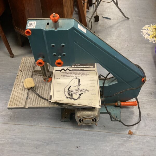 Vintage Black & Decker DN339 band saw, a classic woodworking tool.