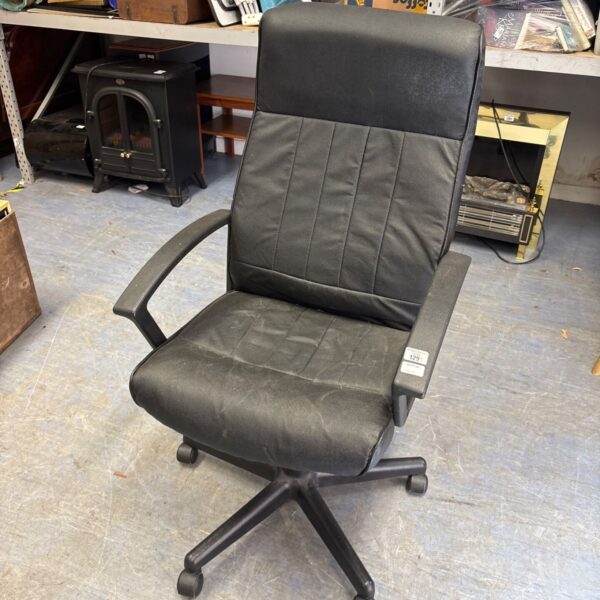 Black faux leather office chair with swivel base.