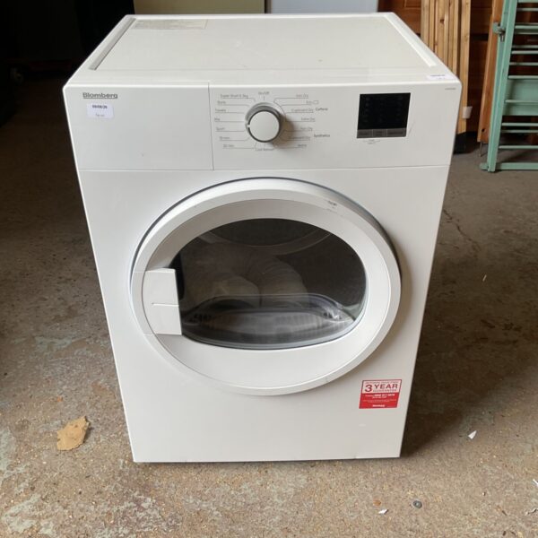 White Bloomberg tumble dryer with control panel visible.