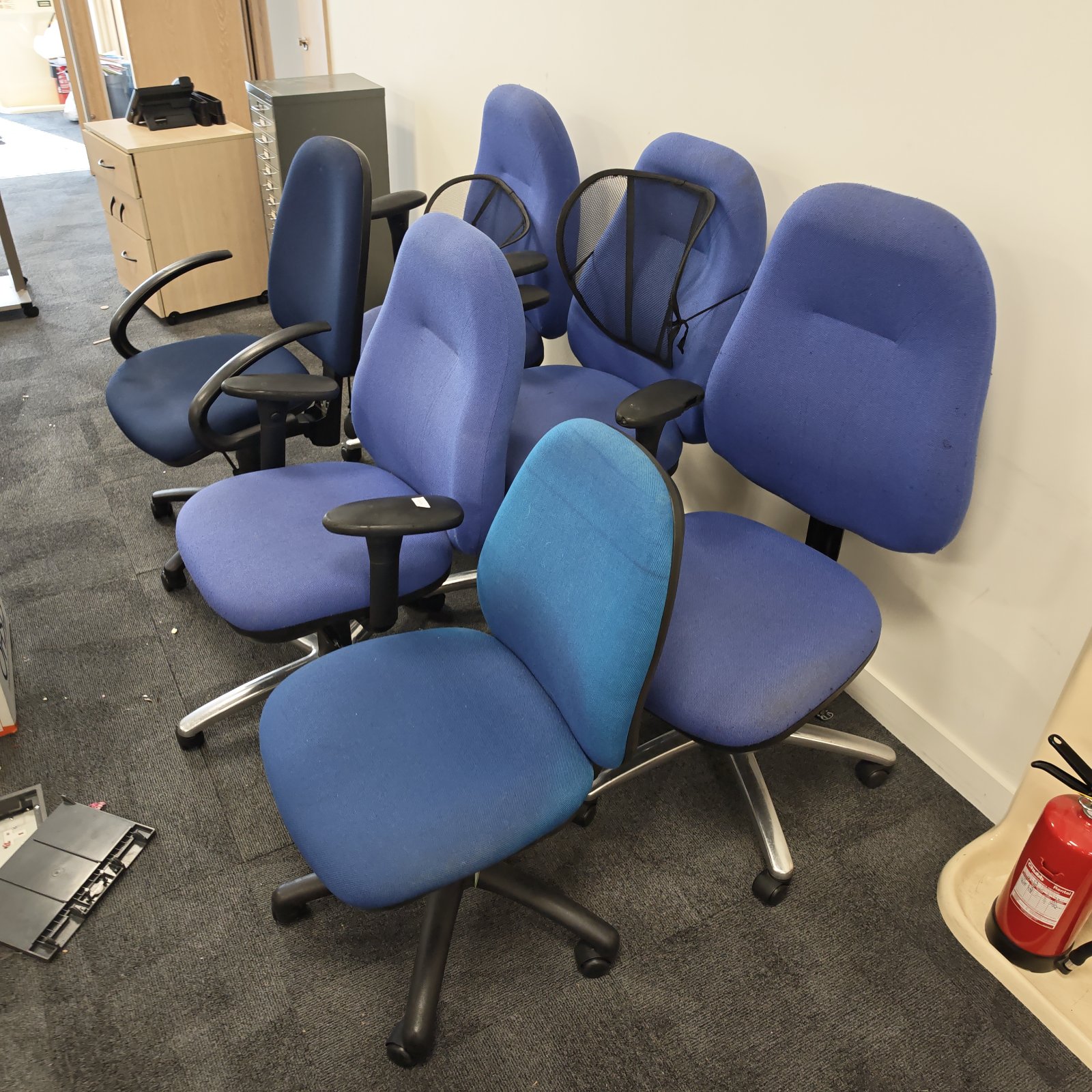 Lot of six blue office swivel chairs for office use.