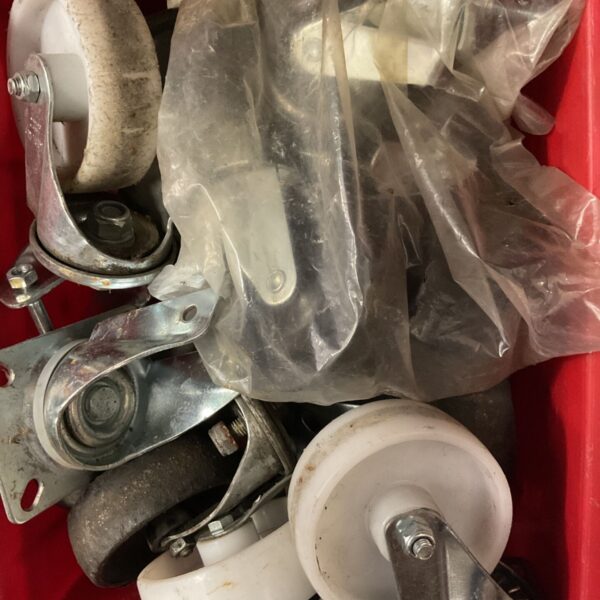 Assorted vintage bogey trolley wheels with metal construction.