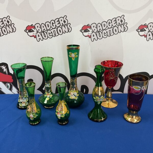 Vintage Bohemian glass vases and goblet with floral details.