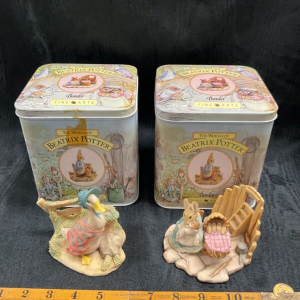 Border Fine Arts Beatrix Potter figurines Jemima Puddle-Duck and Hunca Munca in tins.