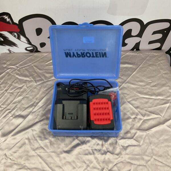 Bosch battery charger for cordless power tools, showing wear.