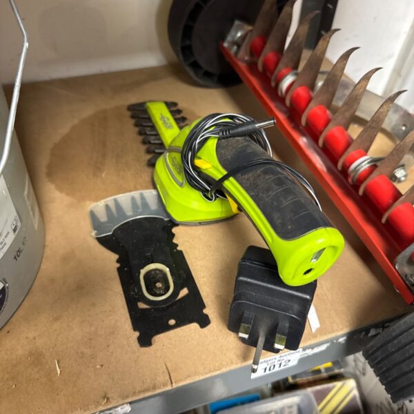 Bosch cordless garden trimmer in green and black.