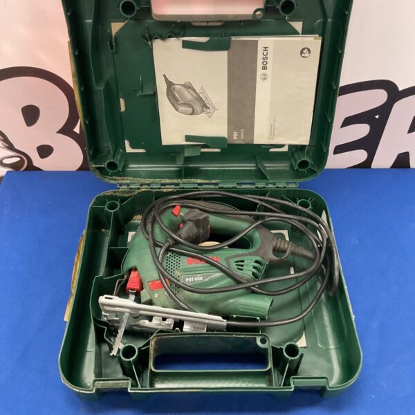 Bosch PST 650 corded jigsaw in open case, showing tool details.