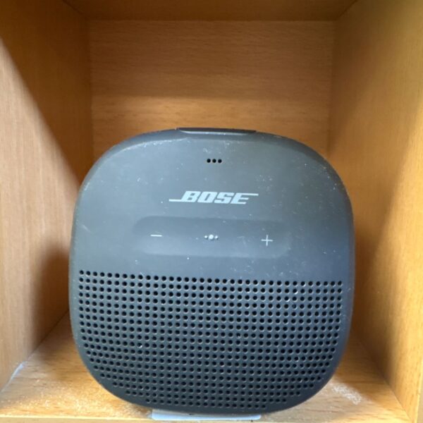 Front view of a black Bose portable Bluetooth speaker.
