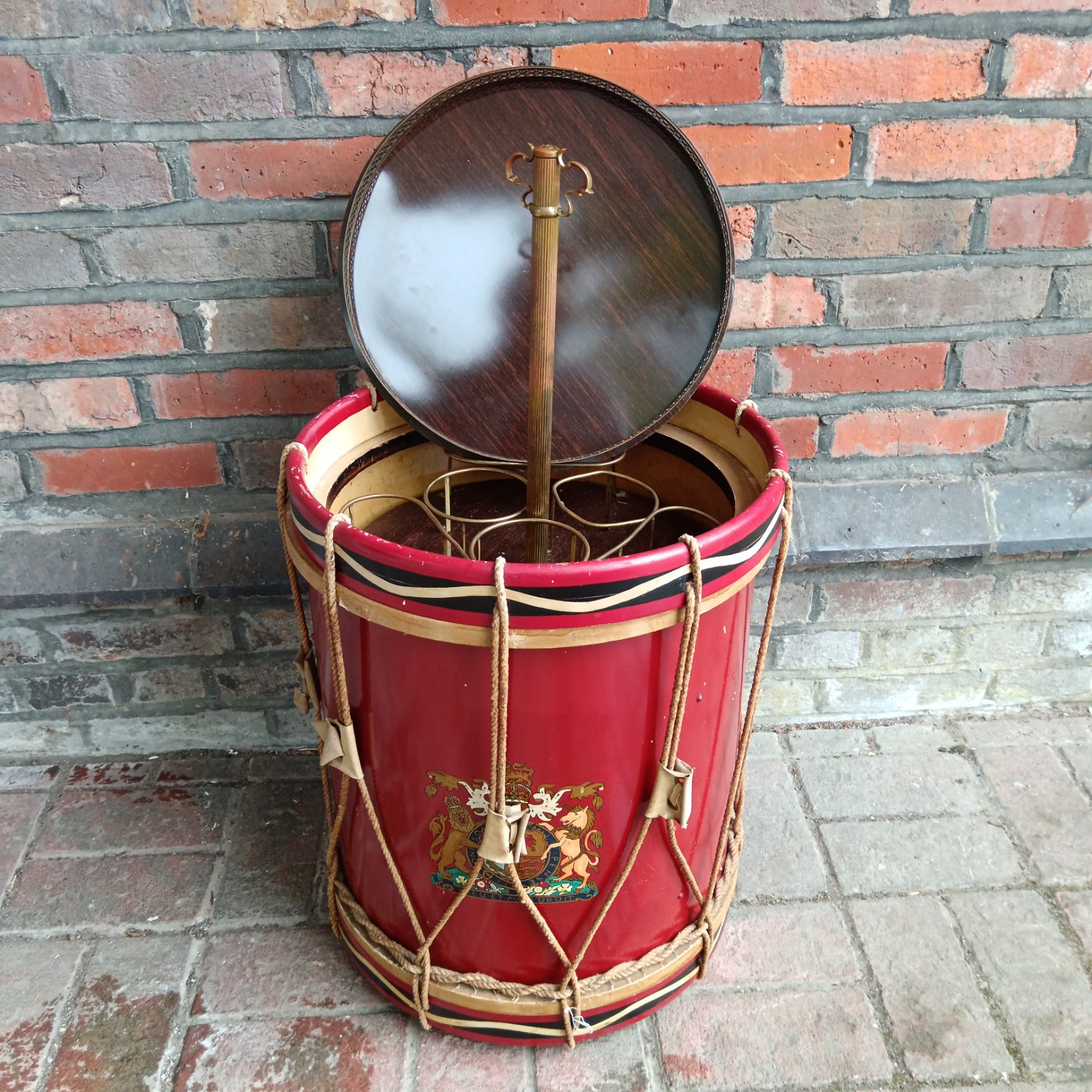 Red Boys Brigade drum converted into a unique bar cabinet.