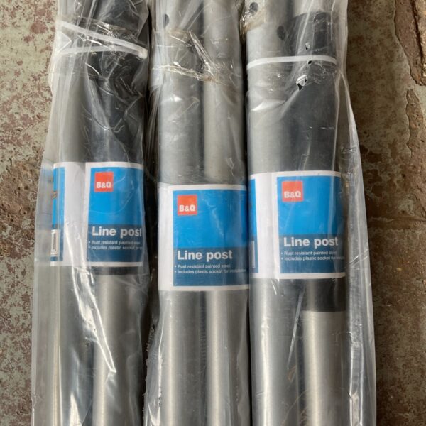 Pack of three B&Q line posts in plastic wrapping.