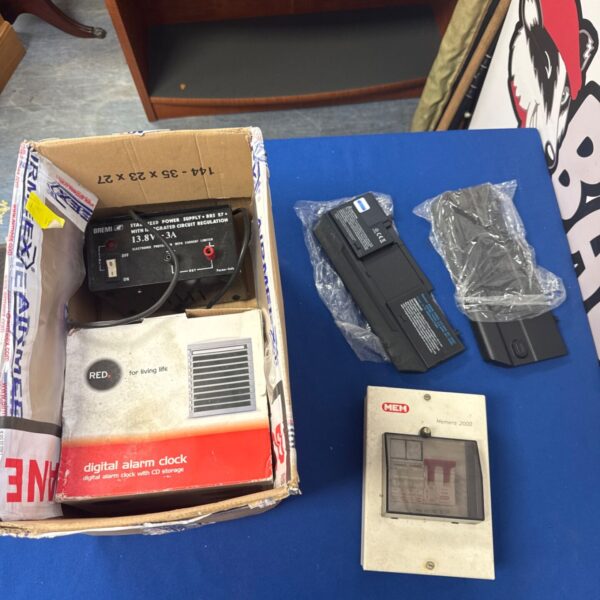 Bremi stabilised power supply with packaging, vintage electrical component.