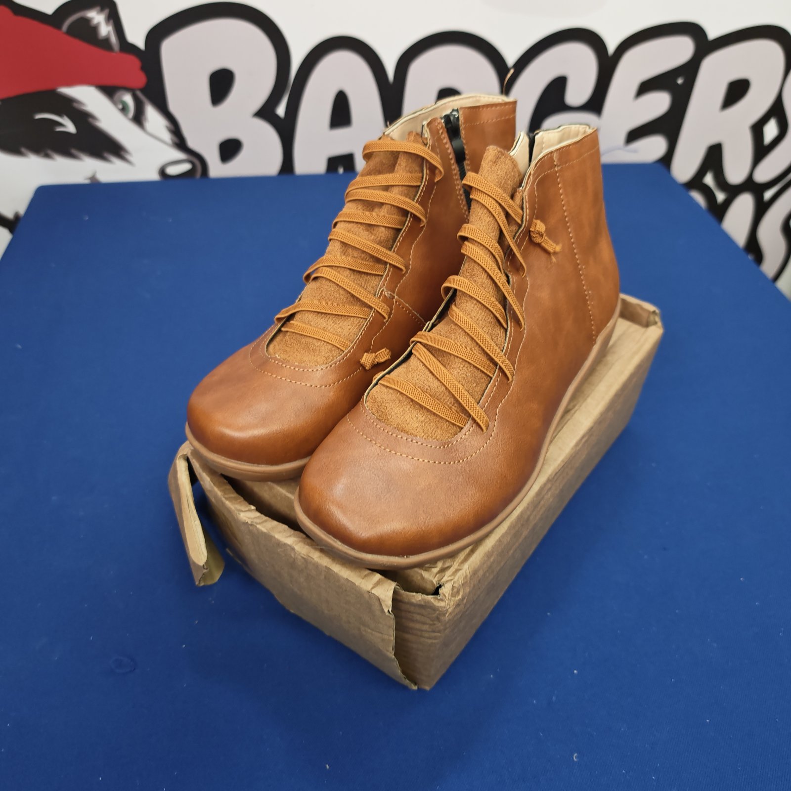 Unused brown leather ankle boots, size 7, vintage style.
