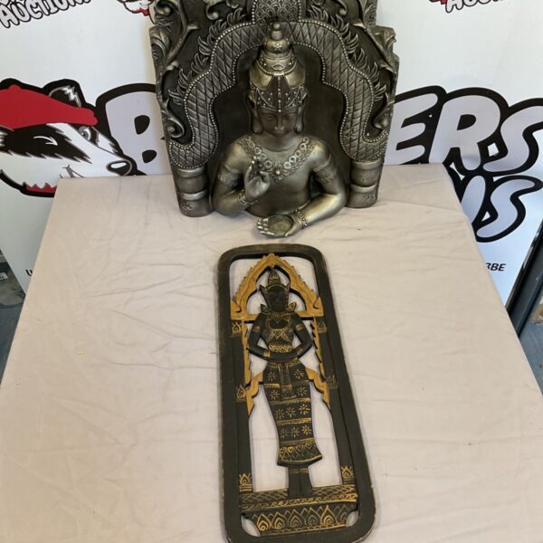 Detailed Buddha wall plaque relief sculpture for home decor.