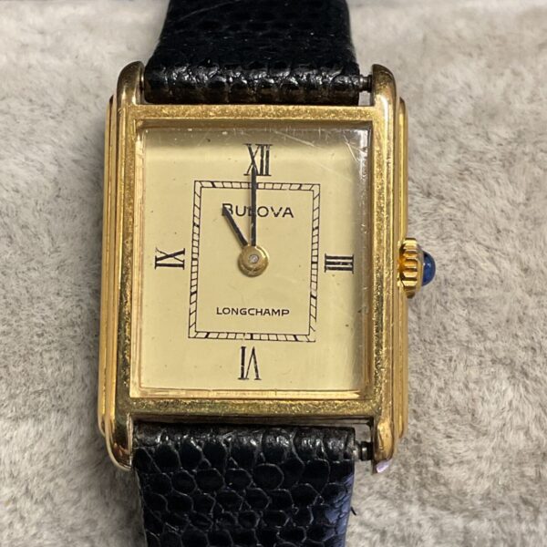 Vintage Bulova Longchamp N9 ladies wristwatch with gold case.