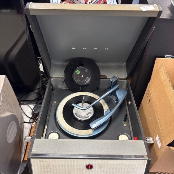 Vintage Bush Monarch record player with lid open.